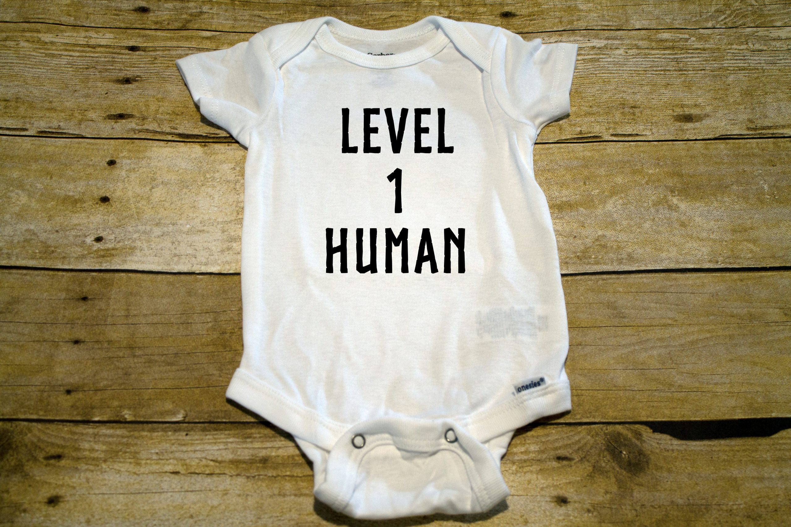 level 1 human onesie